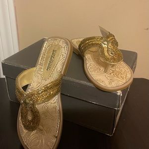 New gold sandals in size 11 toddler.
